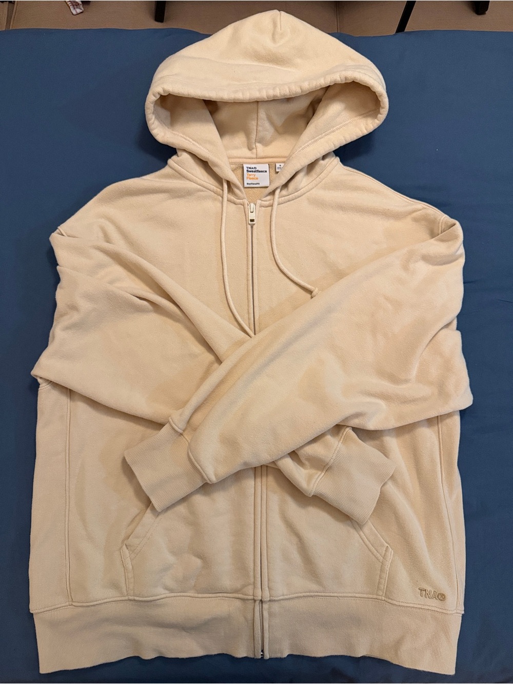 TNA women’s Cream Full-Zip Hoodie Sweater (Aritzia)